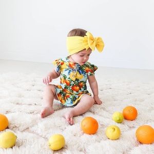 Lucia Ruffled Cap Sleeve Henley Twirl Skirt Bodysuit